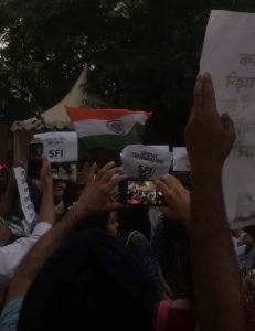 Student protestors outside mandir marg police station